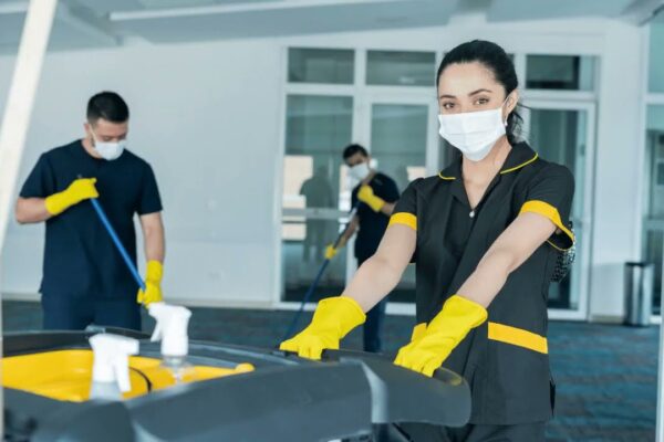Deep Cleaning Services in Raleigh, NC: Everything You Need to Know Professional cleaning staff in uniforms and masks providing commercial and residential hassle-free cleaning services.